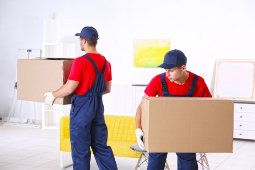 Same-day removals team loading furniture in Catford