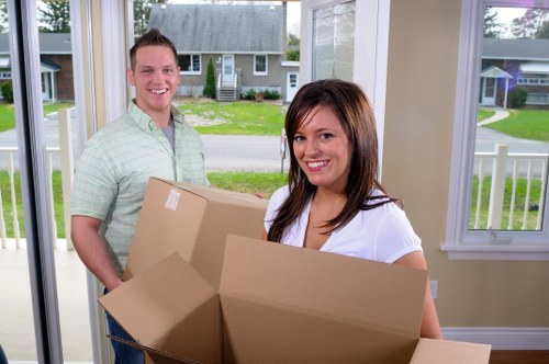 Careful unloading of household items with attention to safety