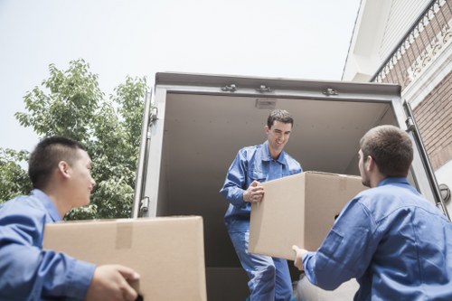 Office equipment and furniture being prepared for moving day