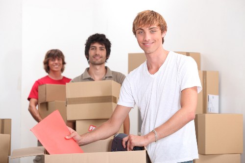 Loading furniture and boxes into a removal van in Catford